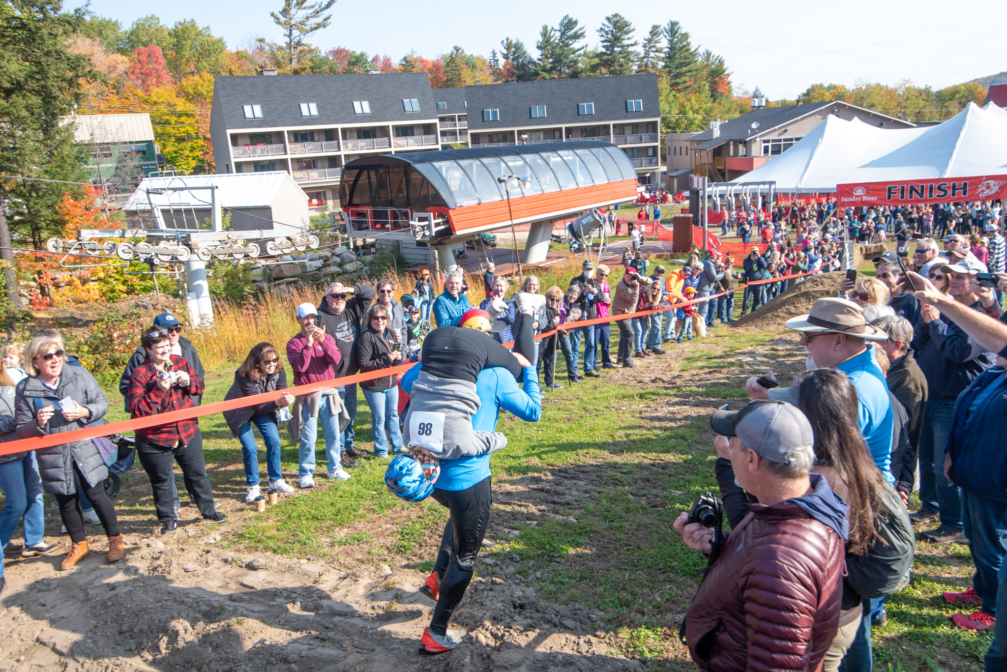 Team running through crowd