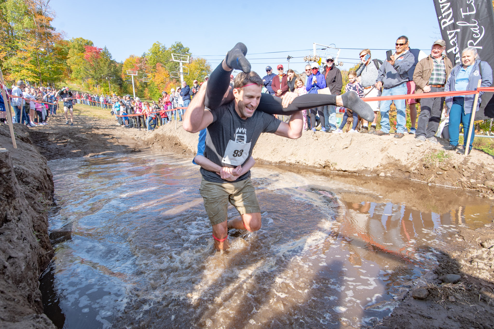 Team running through mud